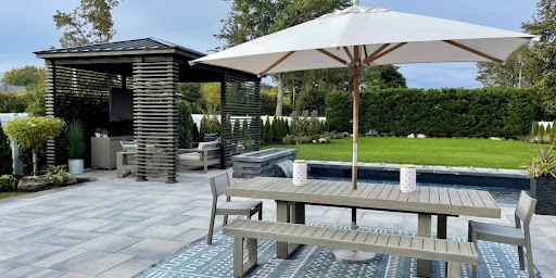 Creating Functional Outdoor Spaces with Pavers: Zoning for Dining, Lounging, and Play